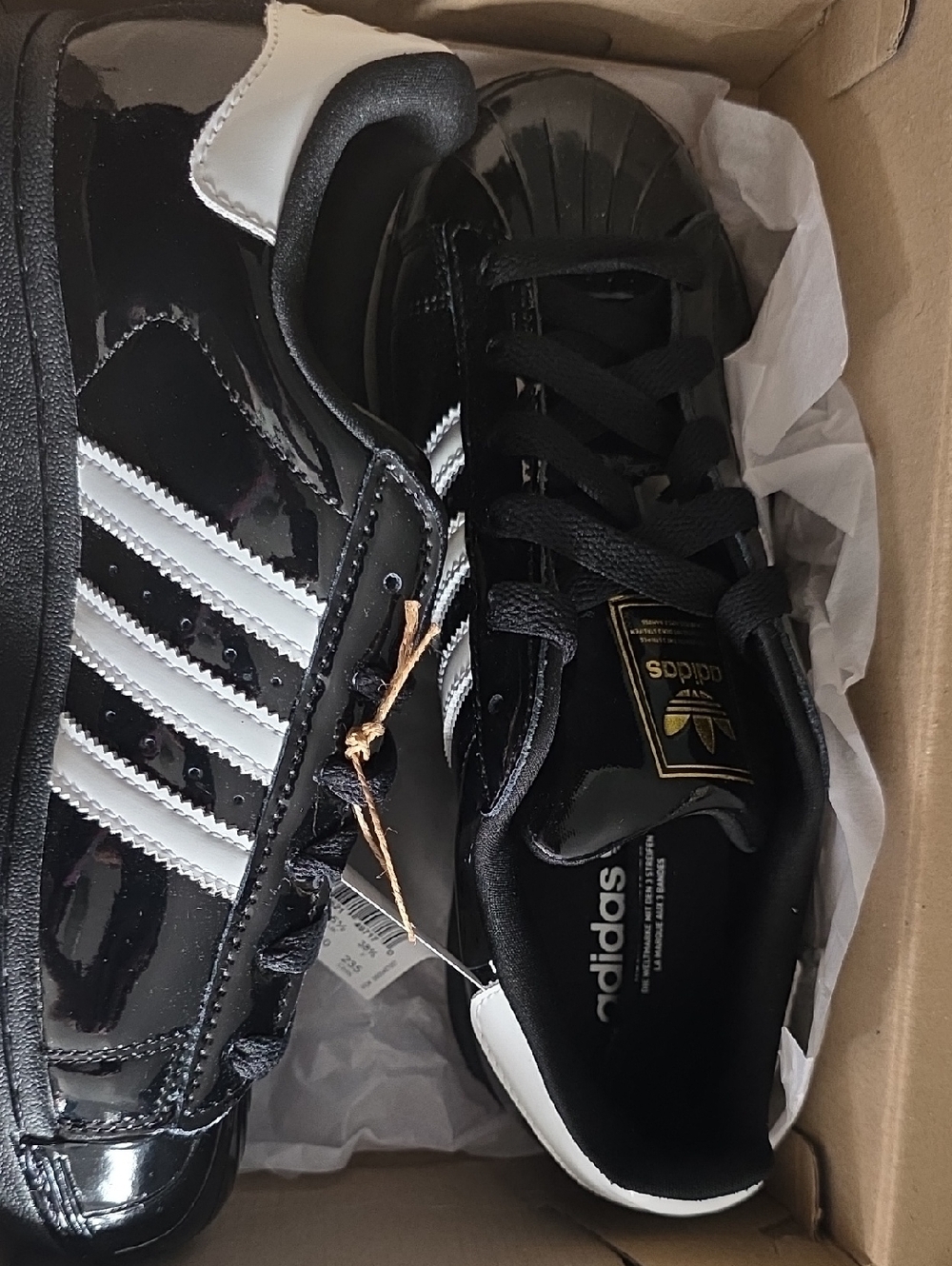 adidas Womens Black Patent Sneaker with White Stripes